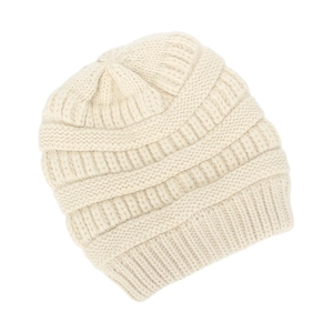 Detail view of cream cable knit beanie showing thick texture and elastic ribbed cuff