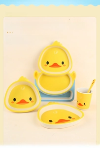 Bamboo fiber yellow duck dinnerware set with divided plate, bowls, cup, and spoon