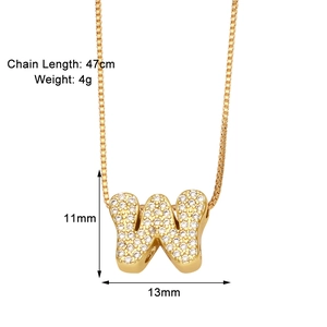 Macro shot of gold-plated letter W pendant with cubic zirconia and box chain measurements