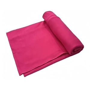 Close-up of soft pink milk silk fabric texture for stylish headscarf or long shawl