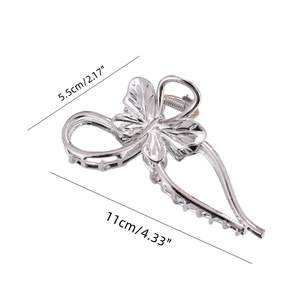 Silver bow-knot metal hair claw clip with cutout design and 11cm size measurements