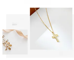 Detailed view of a gold cross pendant necklace featuring shimmering micro-pave crystals