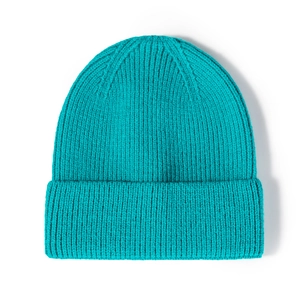 Vibrant turquoise ribbed knit winter beanie hat warm cold cap for men and women