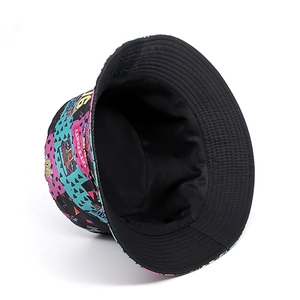 Macro view of reversible bucket hat with colorful 90s geometric patterns and Let's Party text
