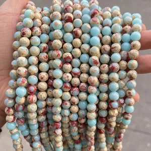 Polished blue and beige sea sediment jasper round beads for DIY jewelry making