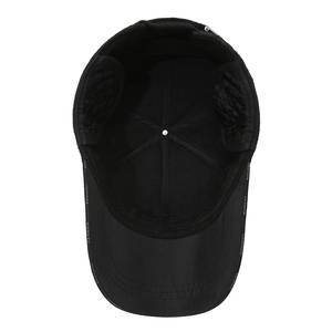 Black quilted baseball cap with ear flaps and FASHION lettering on the brim for winter
