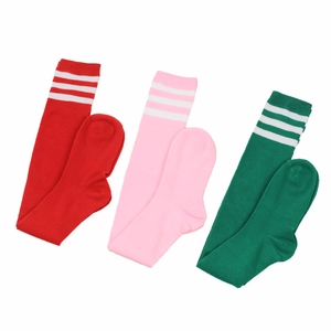 Detailed knit texture of striped mid-calf socks in red, pink, and green colors