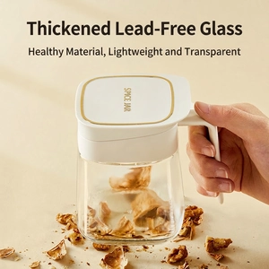 Thick lead-free glass spice jar with ergonomic handle and elegant gold-rimmed white lid