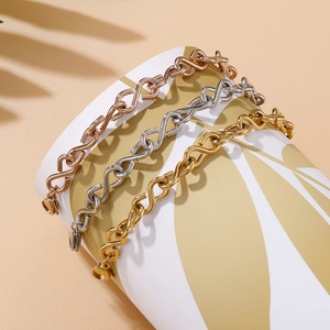 Three-tone infinity knot S-link chains in gold, silver, and rose gold stainless steel