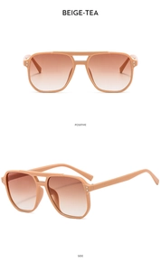 Detailed view of beige-tea double-bridge aviator sunglasses with gradient lenses
