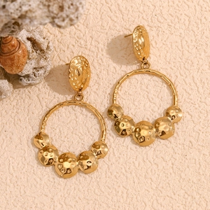 18K gold plated stainless steel hoop earrings featuring handcrafted hammered texture