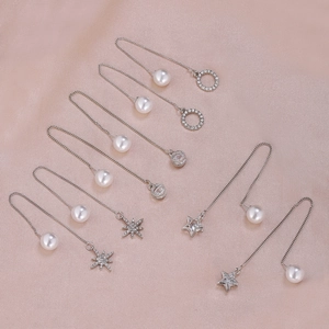 Set of five elegant silver threader earrings with pearls and star-shaped zircon accents
