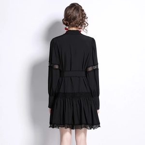 Elegant black long-sleeved dress with slimming lace patchwork and puff sleeves back view
