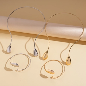 Minimalist metallic teardrop necklace and cuff bracelet set in gold and silver finish
