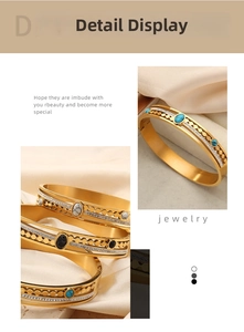 Detailed macro view of gold-plated titanium steel bracelet inlaid with oval turquoise stones