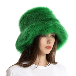 Detailed close-up showing the soft texture of the green faux fur winter bucket hat