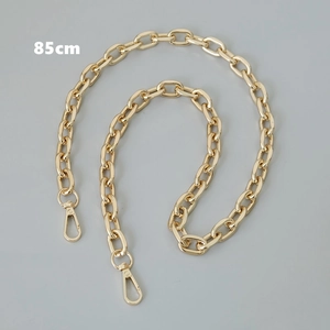Detail of 85cm golden metal handbag chain with swivel hooks for shoulder bags