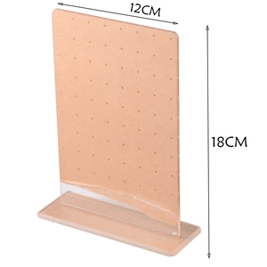 Macro shot of clear acrylic jewelry display stand with dimensions showing 12x18cm size