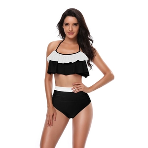 Sexy black and white high waisted bikini set with ruffled halter top and color block bottoms