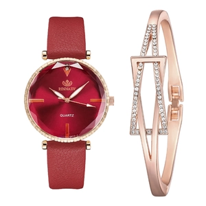 Women's quartz watch with red leather strap and matching rose gold rhinestone bracelet