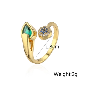 Detail of 18K gold plated ring with green teardrop stone and 1.8cm inner diameter