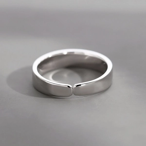 Minimalist silver copper alloy open ring with a polished surface in a retro design