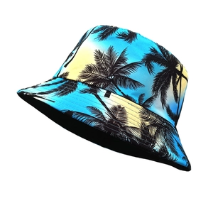 Unisex bucket hat with blue and yellow gradient and black tropical palm tree print