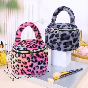 Detailed view of leopard plush makeup bags with dimensions 16x12x12 cm.