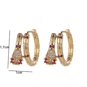 Detailed size view showing 1.7cm height of gold snake-textured earrings with cubic zirconia