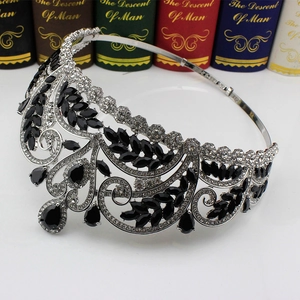 Detailed view of silver bridal crown with black marquise gems and clear rhinestones