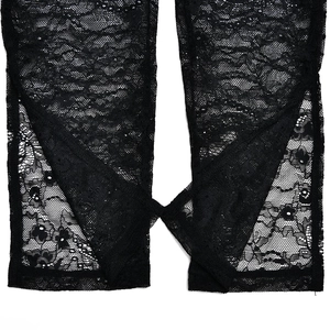 Detailed close-up showing the intricate mesh texture and floral patterns of black lace sleeves