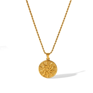 Golden stainless steel sun totem pendant necklace with twisted rope chain on white background