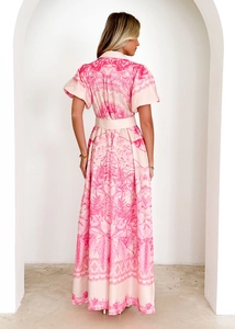 Rear view of pink floral long dress with high waist and tropical print details