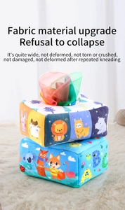 Detail of plush baby tissue box toy with animal patterns and colorful chiffon scarves