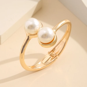 Minimalist gold open cuff bracelet with dual pearls and hinge clasp design