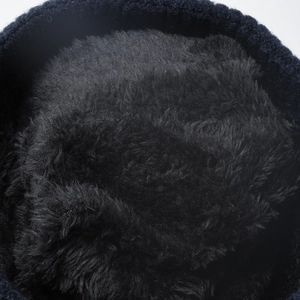 Navy knit winter beanie with thick black faux fur fleece lining for maximum warmth