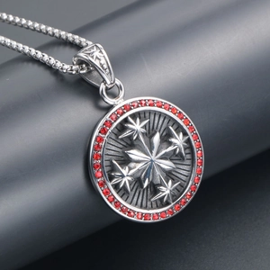 Vintage stainless steel necklace with a star pendant and red rhinestones on a metal chain