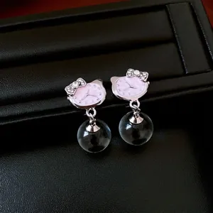 Silver needle cat earrings with pink enamel and a clear glass bead pendant