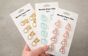Close-up of novelty paper clips in pineapple, planet and diamond shapes, 8pcs per pack