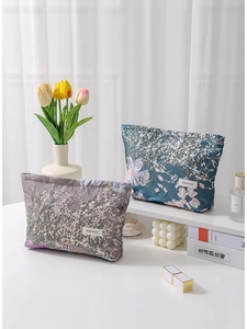 Floral jacquard large capacity cosmetic bag with stylish gold silk pattern and zip closure