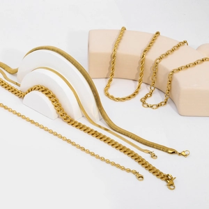 Detail of 18K gold plated stainless steel snake, cuban and rope chain necklace collection