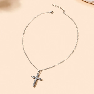 Elegant silver cross necklace with sparkling crystals on a minimalist chain for women