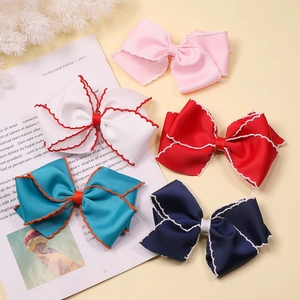 Five assorted bow hair clips for girls with decorative contrast edge stitching