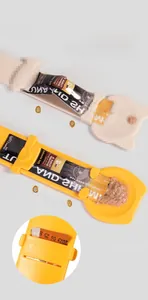 Detail view of the cat liquid treat feeder spoon featuring a dual-slot squeeze design