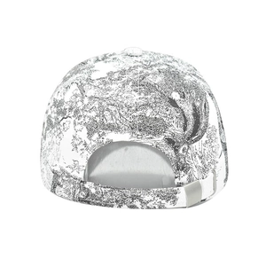 Detail view of tie-dye baseball cap back with adjustable strap and metal buckle