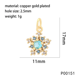 Detailed view of a gold-plated snowflake pendant with blue crystal and technical dimensions