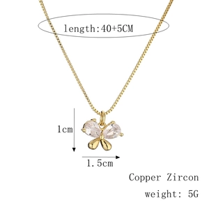Detail of gold butterfly necklace with zircon drop pendant and size specifications