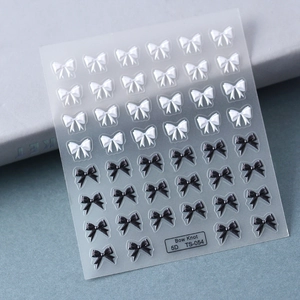 Detailed macro view of black and white 5D embossed bow knot nail art stickers TS-054