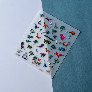 3D embossed dinosaur nail stickers with colorful prehistoric motifs on TS-150 sheet