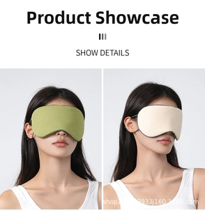 Close-up of green and beige breathable silk sleep masks with adjustable ear straps